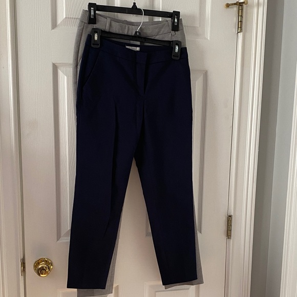 Bundles of Women dress pants.